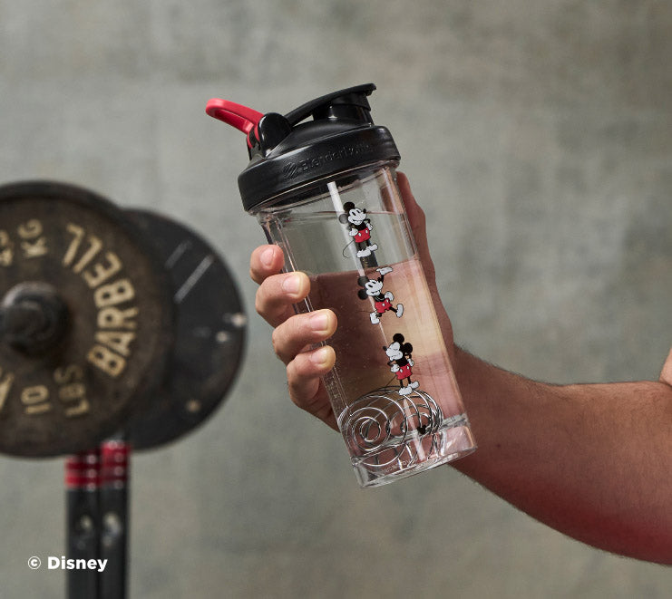 pro-series-x2 Mickey_Mouse_Protein_Shaker_Bottle_Being_Held_In_the_Gym.jpg